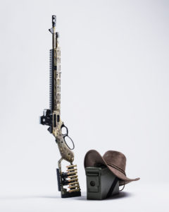 Modern lever action rifle with custom modifications and optics"